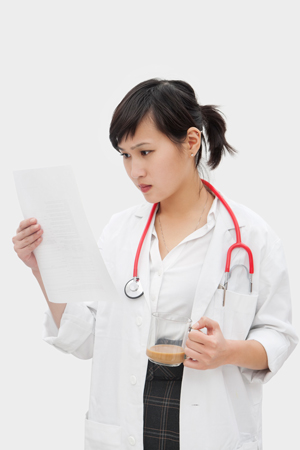 Veterinarian reading a document